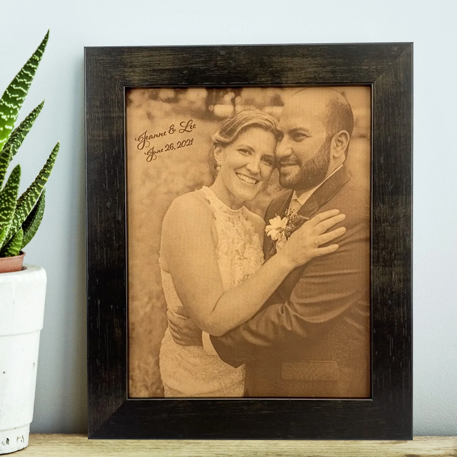 Exact Etsy listing image of Engraved Leather Photo Portrait