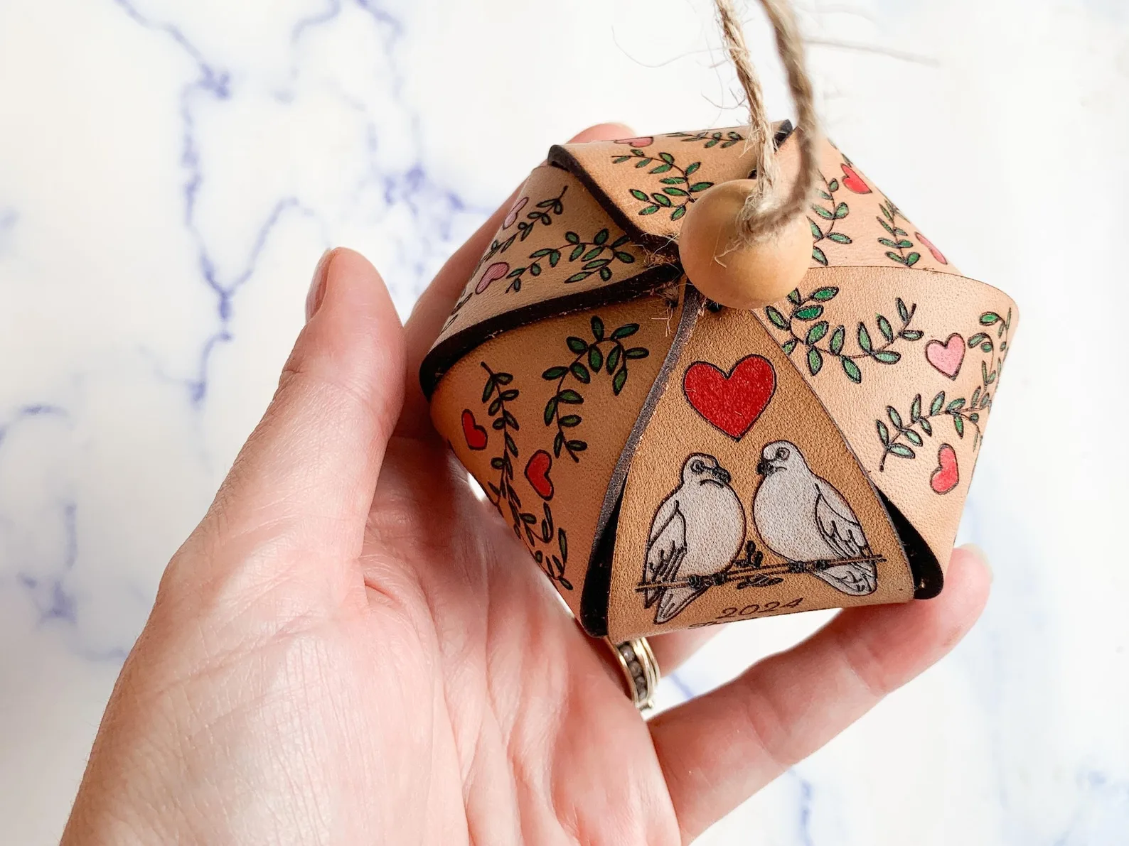 Exact Etsy listing image of Personalized Leather Anniversary Ornament