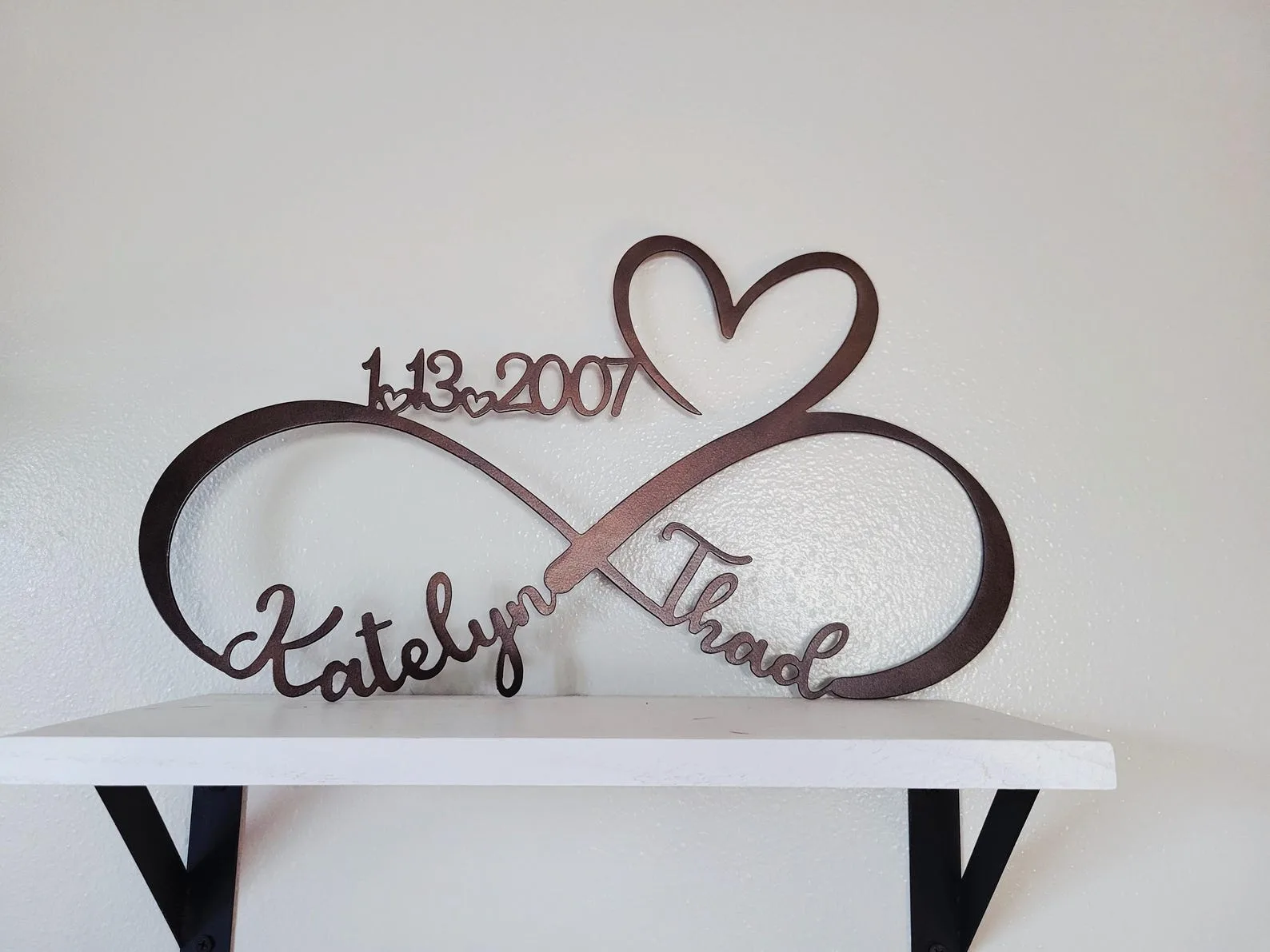 Exact Etsy listing image of Personalized Bronze Infinity Symbol