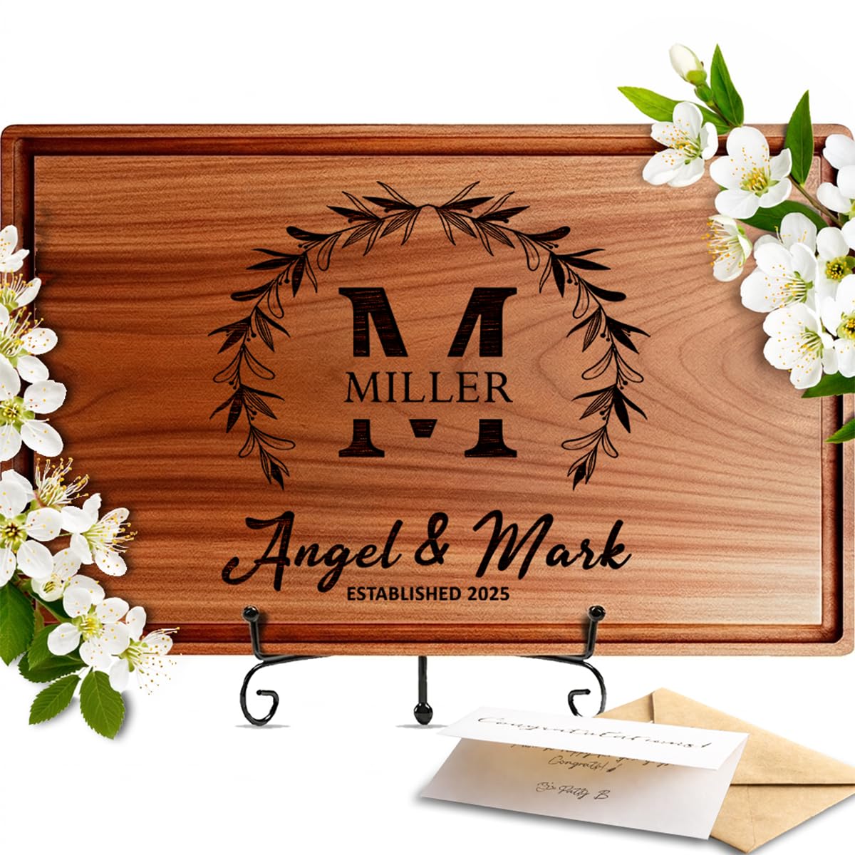 Walnut wedding cutting board personalized with a couple's initials and date